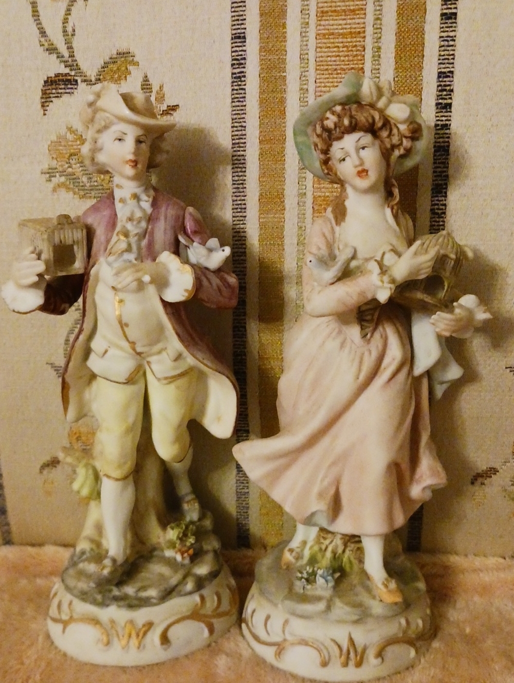 Source Unknown Pink and Cream Porcelain Victorian Couple Figurine Pair
